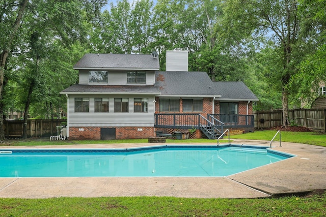 105 Londonderry Rd, Goose Creek, SC 29445 - back of property featuring a deck, a chimney, and roof with shingles