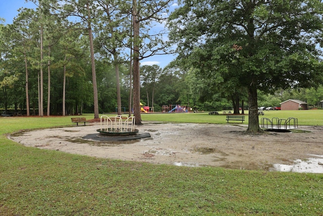 105 Londonderry Rd, Goose Creek, SC 29445 - surrounding community featuring a yard and view of wooded area