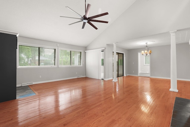 105 Londonderry Rd, Goose Creek, SC 29445 - unfurnished living room featuring a chandelier, ceiling fan, ornate columns, high vaulted ceiling, and baseboards