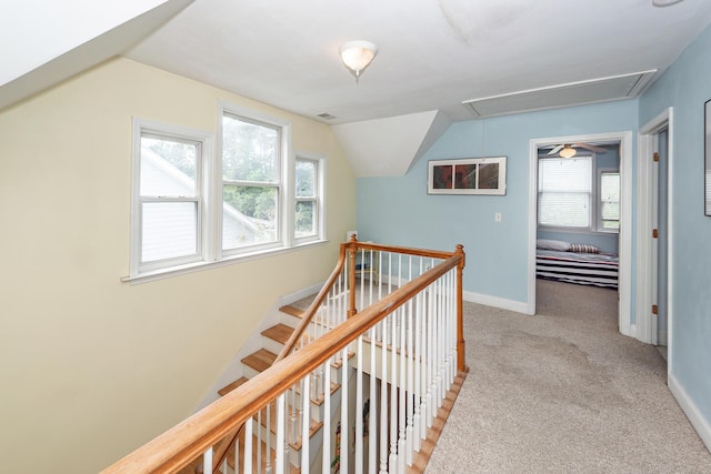 2613 Rivertowne Pkwy, Mount Pleasant, SC 29466 - hallway featuring attic access, lofted ceiling, carpet floors, an upstairs landing, and baseboards