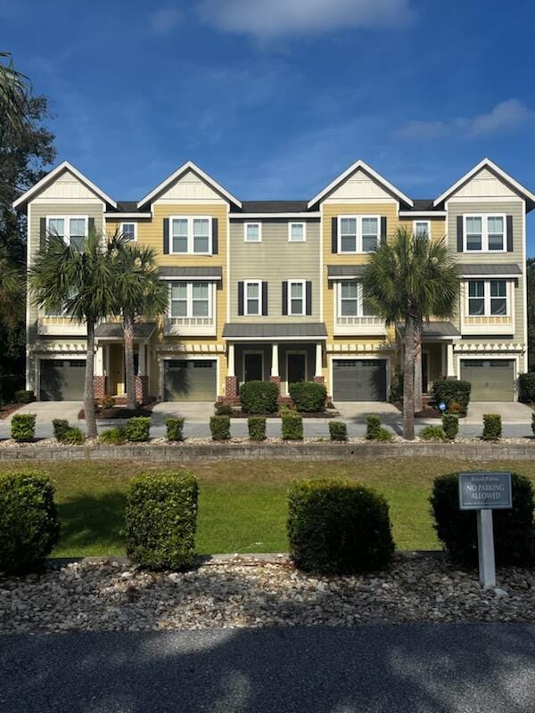 view of front of property with a garage