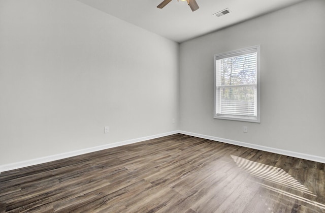 empty room featuring ceiling fan and wood-type flooring