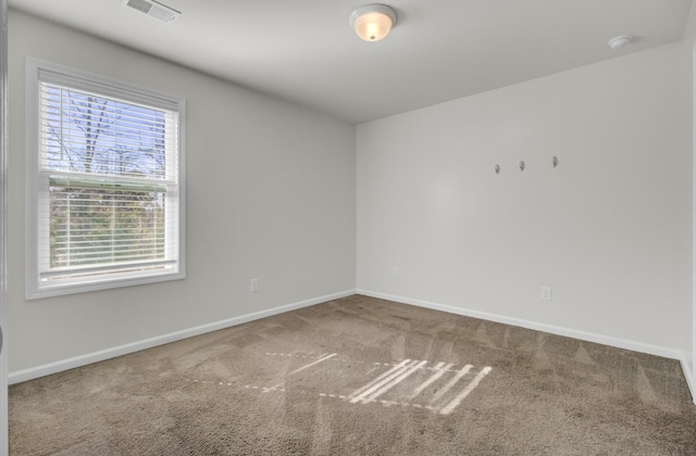 empty room featuring carpet