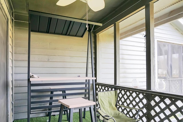 balcony featuring a ceiling fan