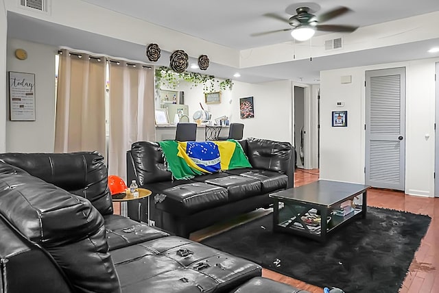 living area featuring visible vents, recessed lighting, a ceiling fan, and wood finished floors