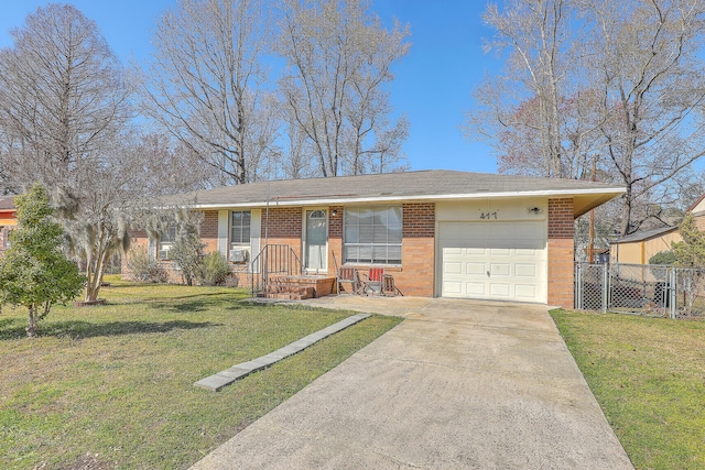 single story home with a front yard, fence, concrete driveway, a garage, and brick siding