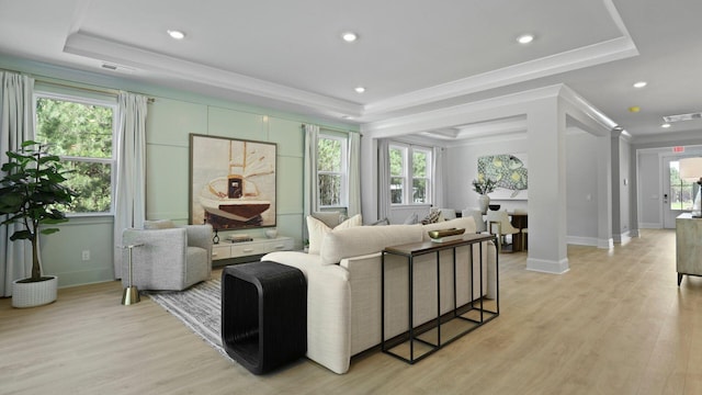 212 Bilge Rd, Ridgeville, SC 29472 - living room featuring a raised ceiling, ornamental molding, baseboards, light wood-style floors, and recessed lighting