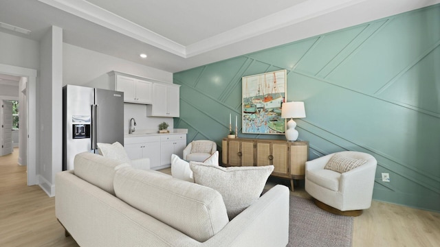 212 Bilge Rd, Ridgeville, SC 29472 - living area with light wood-type flooring, a decorative wall, recessed lighting, and baseboards