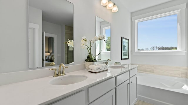 212 Bilge Rd, Ridgeville, SC 29472 - bathroom with double vanity and a bath