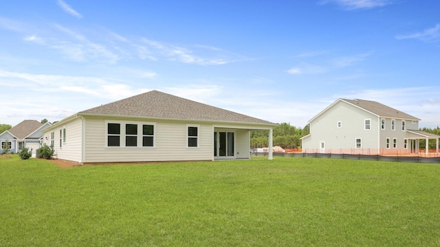 212 Bilge Rd, Ridgeville, SC 29472 - back of property with a lawn