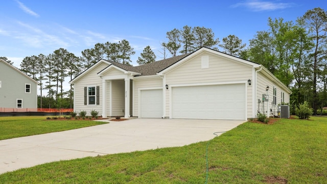 212 Bilge Rd, Ridgeville, SC 29472 - ranch-style house with a garage, driveway, a front lawn, and cooling unit