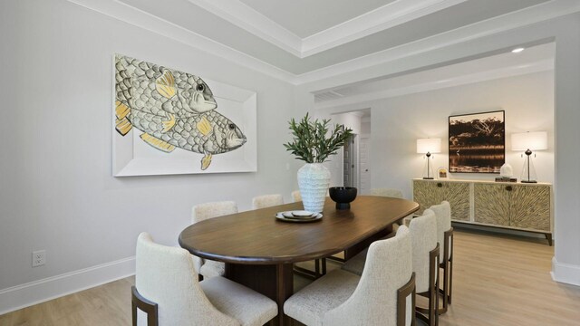212 Bilge Rd, Ridgeville, SC 29472 - dining room with light wood-style flooring, baseboards, and ornamental molding