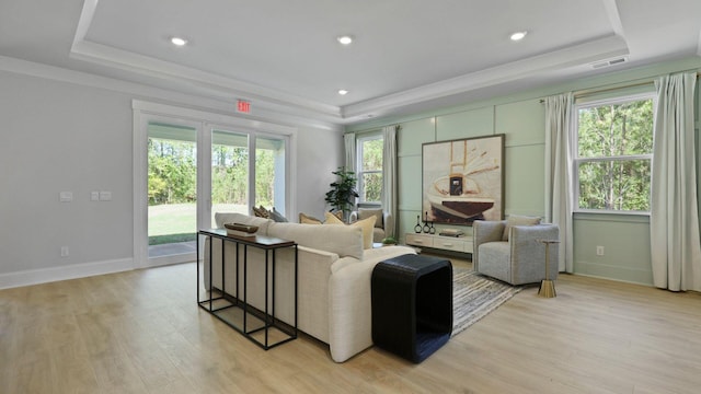 212 Bilge Rd, Ridgeville, SC 29472 - living room with a tray ceiling, light wood-style flooring, baseboards, and recessed lighting