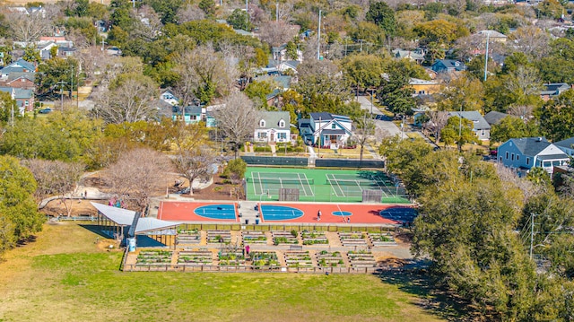 birds eye view of property with a residential view