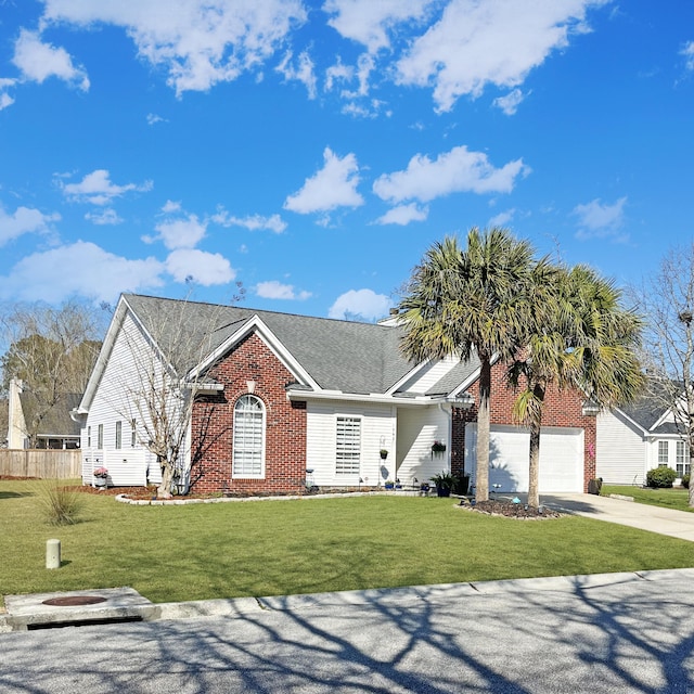 view of front facade featuring brick siding, concrete driveway, fence, a garage, and a front lawn