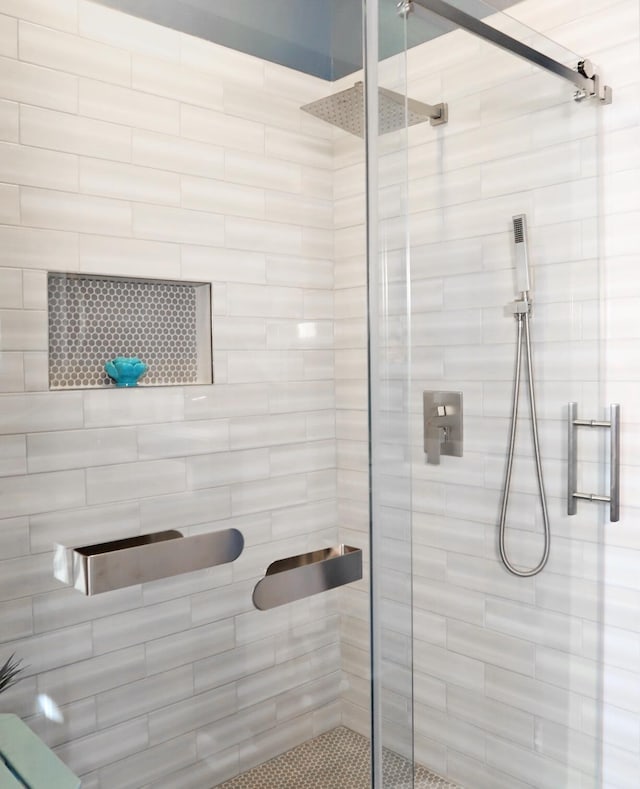 bathroom featuring a stall shower