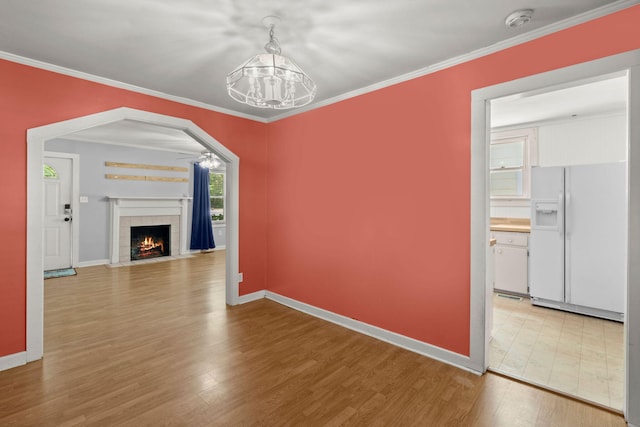 309 Padgett Loop, Walterboro, SC 29488 - unfurnished dining area with a chandelier, light wood finished floors, baseboards, and ornamental molding