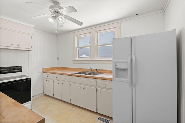 309 Padgett Loop, Walterboro, SC 29488 - kitchen featuring white fridge with ice dispenser, electric range oven, a sink, ornamental molding, and light floors