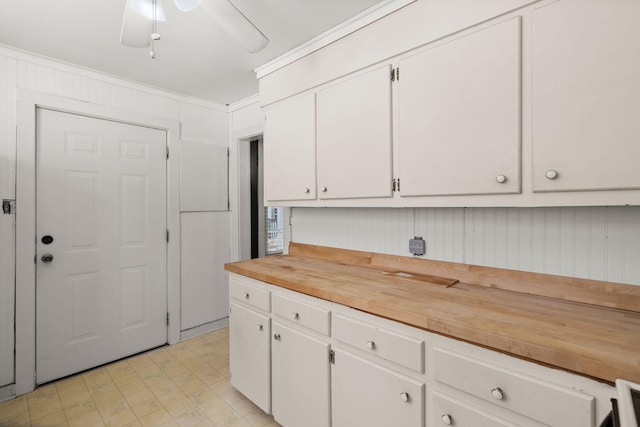 309 Padgett Loop, Walterboro, SC 29488 - kitchen with wood counters, light floors, white cabinetry, and a ceiling fan