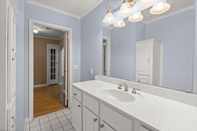 309 Padgett Loop, Walterboro, SC 29488 - bathroom featuring tile patterned flooring, vanity, baseboards, and ornamental molding