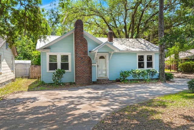 309 Padgett Loop, Walterboro, SC 29488 - view of front of house featuring a chimney, metal roof, and entry steps