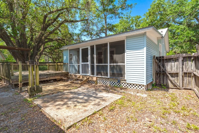 309 Padgett Loop, Walterboro, SC 29488 - rear view of property with a sunroom and a deck