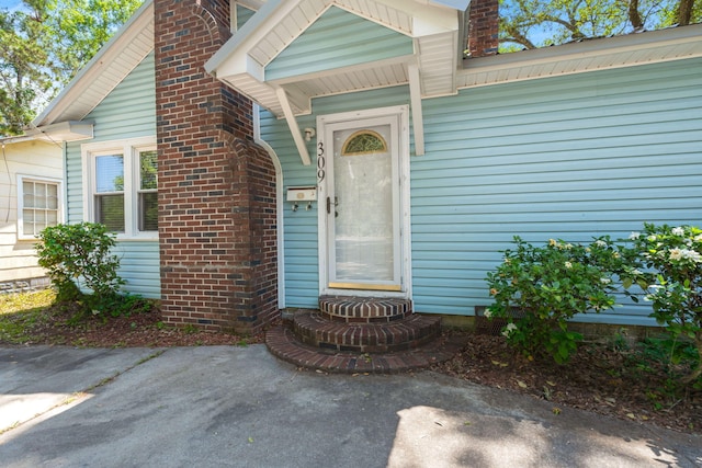 309 Padgett Loop, Walterboro, SC 29488 - property entrance featuring a chimney