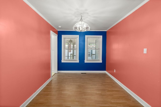 309 Padgett Loop, Walterboro, SC 29488 - unfurnished dining area with a chandelier, ornamental molding, wood finished floors, and baseboards