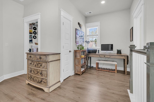 office area with recessed lighting, visible vents, baseboards, and light wood-style flooring