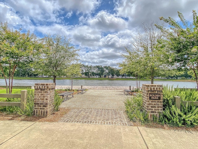 view of home's community featuring a water view