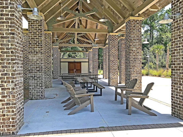 view of patio / terrace with a gazebo and a fireplace