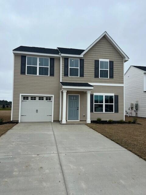 front facade with a garage