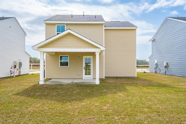 632 Mulligan Way, Santee, SC 29142 - rear view of house with a yard and a patio