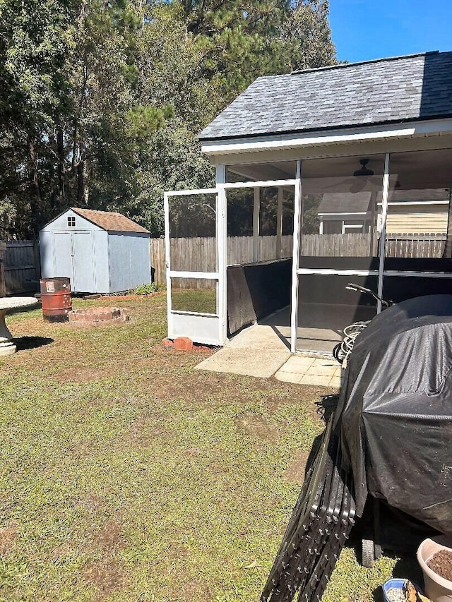 view of yard with a storage unit