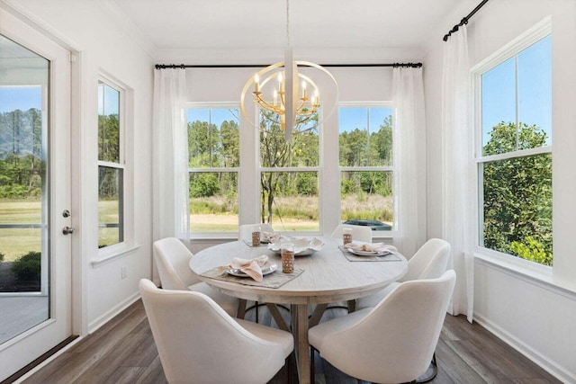 sunroom with a notable chandelier and plenty of natural light