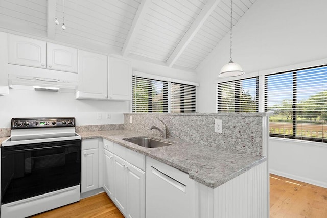 811 Treeloft Trce, Seabrook Island, SC 29455 - kitchen featuring range with electric stovetop, under cabinet range hood, light wood-style flooring, a peninsula, and white cabinets