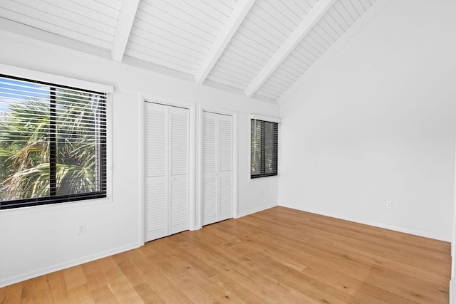 811 Treeloft Trce, Seabrook Island, SC 29455 - unfurnished bedroom with light wood-style flooring and two closets