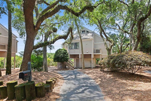 811 Treeloft Trce, Seabrook Island, SC 29455 - view of front facade featuring stairs and asphalt driveway