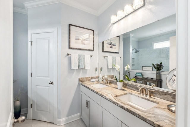 full bathroom with crown molding, baseboards, walk in shower, and a sink