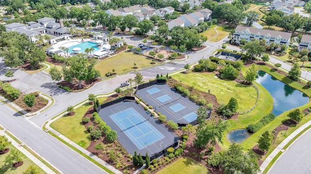 aerial view featuring a residential view and a water view