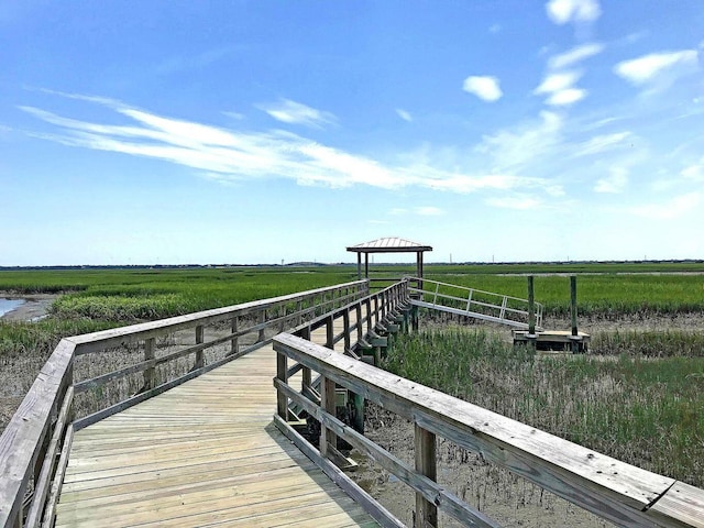 view of dock featuring a rural view and a gazebo