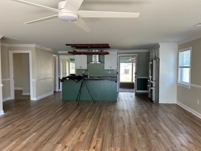 2222 Lakeshore Dr, Manning, SC 29102 - kitchen with white cabinets, a ceiling fan, dark wood-type flooring, crown molding, and dark countertops