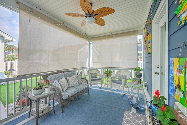 exterior space with outdoor lounge area and a ceiling fan