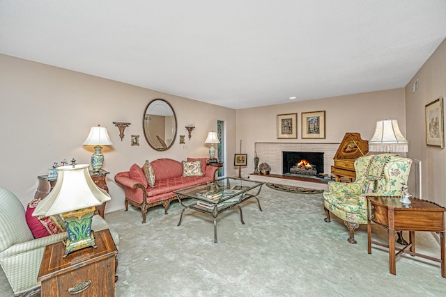 carpeted living room with a brick fireplace