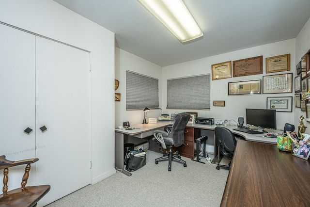 home office featuring light carpet