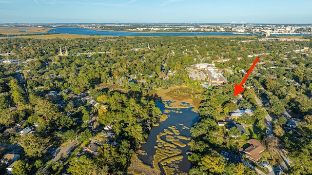 birds eye view of property featuring a water view