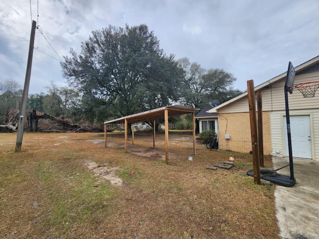 view of yard featuring a carport