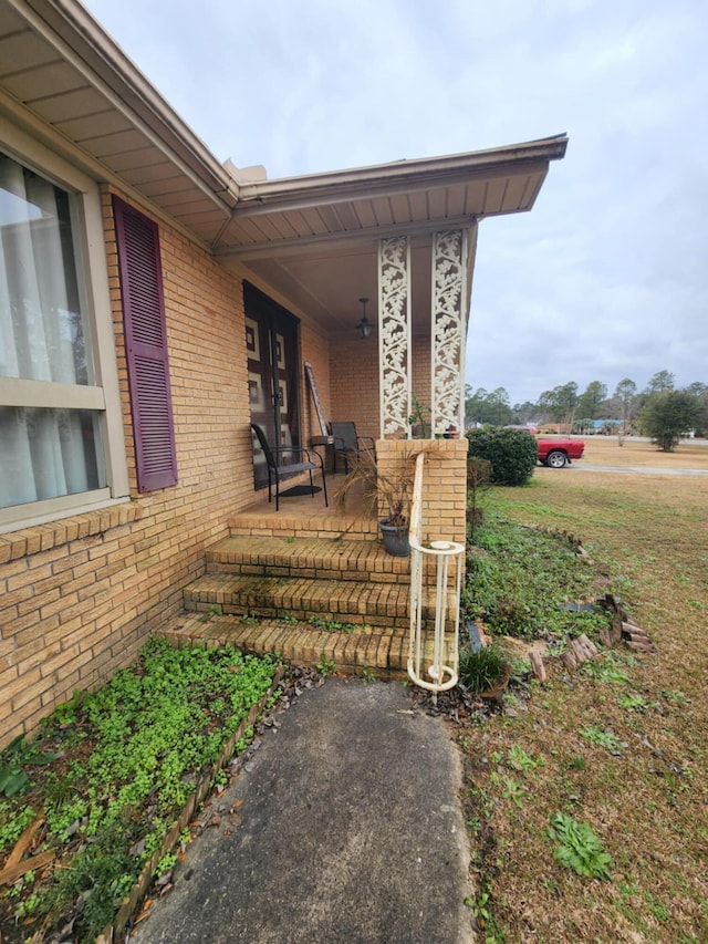 doorway to property featuring a porch