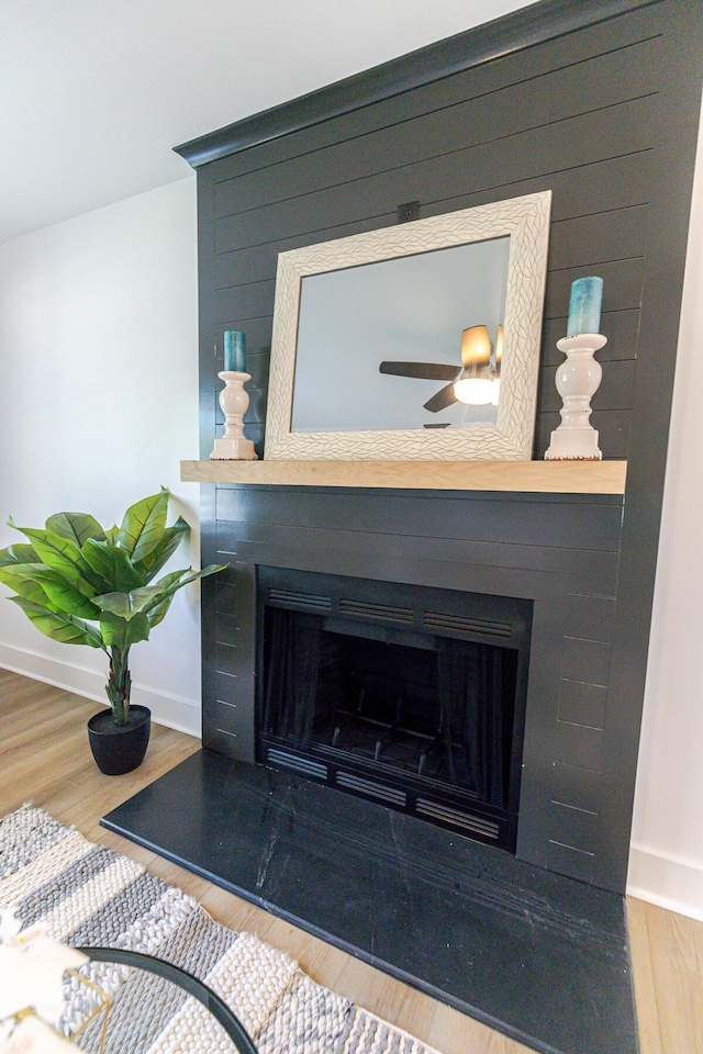 2020 Piper Dr, Charleston, SC 29407 - detailed view of a large fireplace, wood finished floors, and a ceiling fan