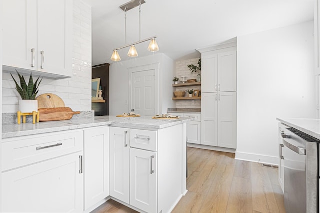 2020 Piper Dr, Charleston, SC 29407 - kitchen featuring dishwasher, open shelves, a peninsula, and white cabinetry